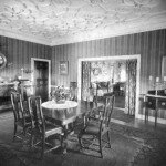 The dining room looks into the living room